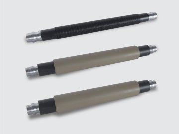 Three top rollers fitted with rubber cots
